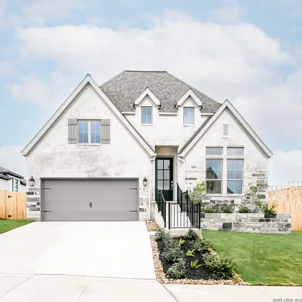Front exterior of a new home in Cibolo Valley Heights, Cibolo, TX, highlighting curb appeal (Image 1). Front exterior of a new home in Cibolo Valley Heights, Cibolo, TX, highlighting curb appeal (Image 1).