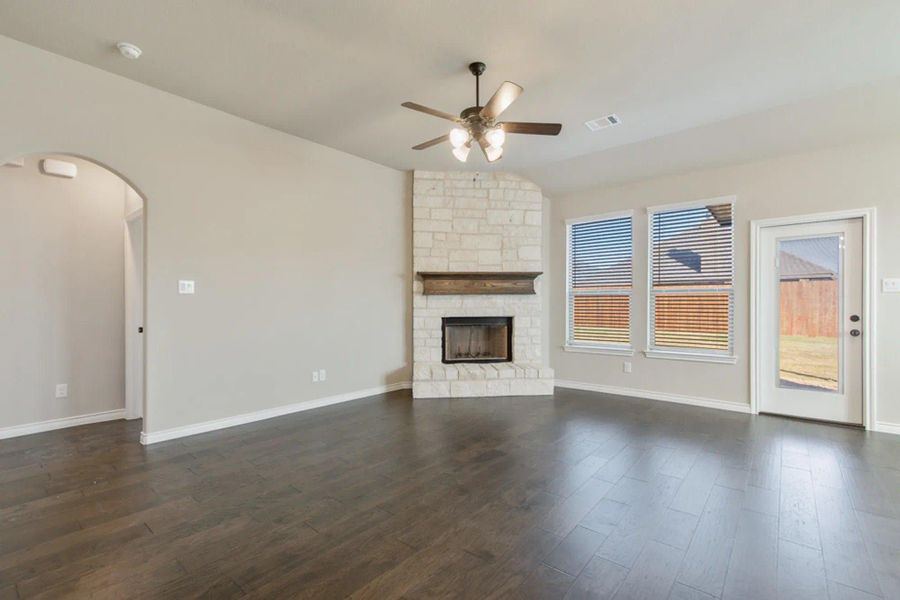 Family Room | Concept 2440 at Hulen Trails in Fort Worth, TX by Landsea Homes