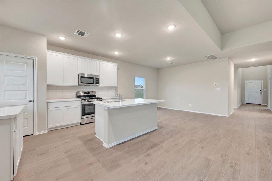 Furnished interior view inside a new home in Carillon, Manor (Image 9).