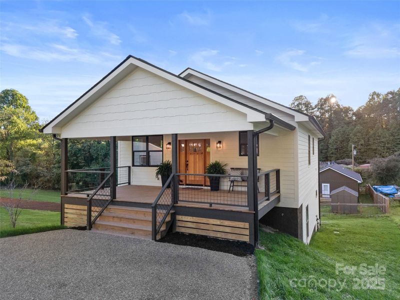 Front exterior of a new home in , Brevard, NC, highlighting curb appeal (Image 1). Front exterior of a new home in , Brevard, NC, highlighting curb appeal (Image 1).
