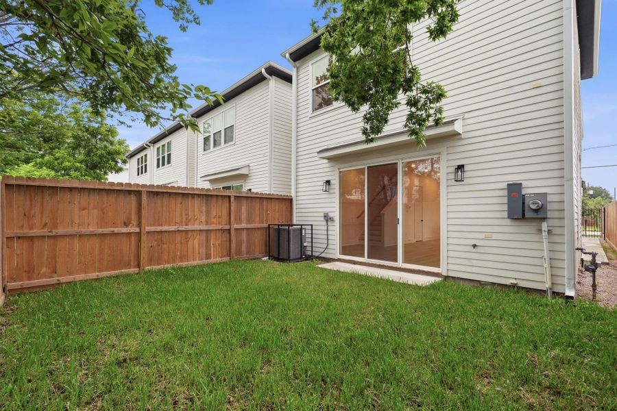 Exterior details and patio area of a home in , Houston (Image 3).
