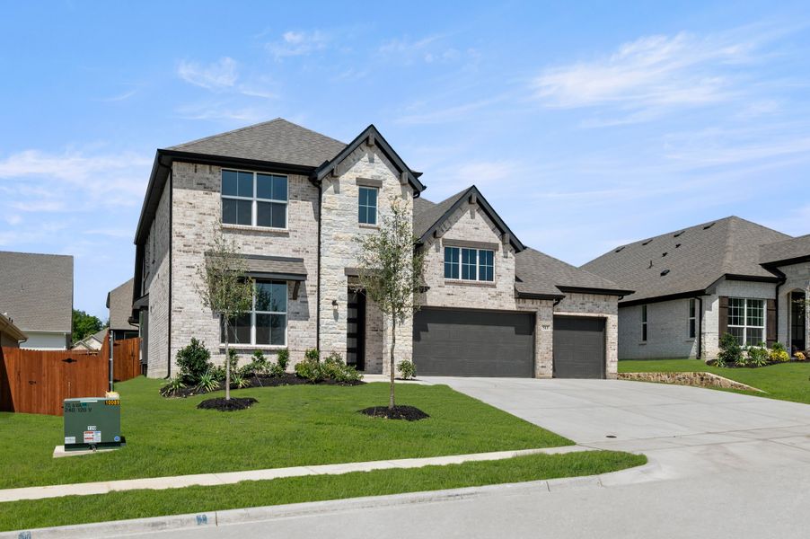 Front exterior of a new home in Waterford Park, Weatherford, TX, highlighting curb appeal (Image 2). Front exterior of a new home in Waterford Park, Weatherford, TX, highlighting curb appeal (Image 2).