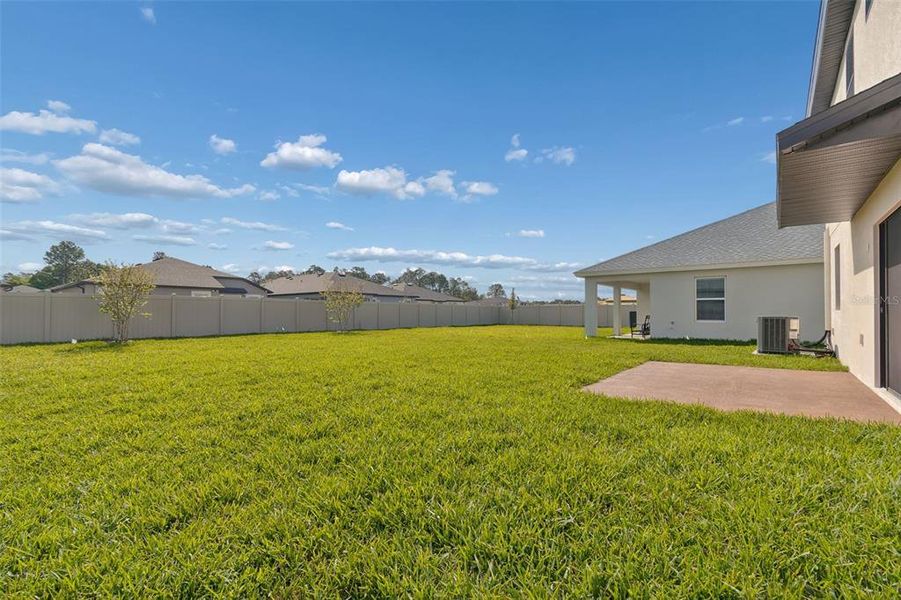 Exterior details and patio area of a home in Avalon West, Spring Hill (Image 37).