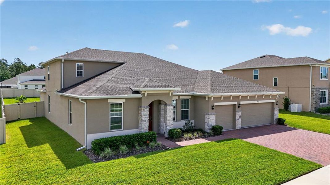 Front exterior of a new home in , Mount Dora, FL, highlighting curb appeal (Image 21). Front exterior of a new home in , Mount Dora, FL, highlighting curb appeal (Image 21).