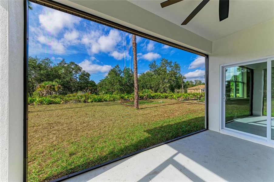 Exterior details and patio area of a home in , North Port (Image 25).
