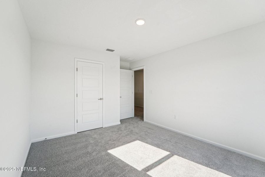 Spacious, unfurnished interior of a new home in Panther Creek, Jacksonville (Image 18).