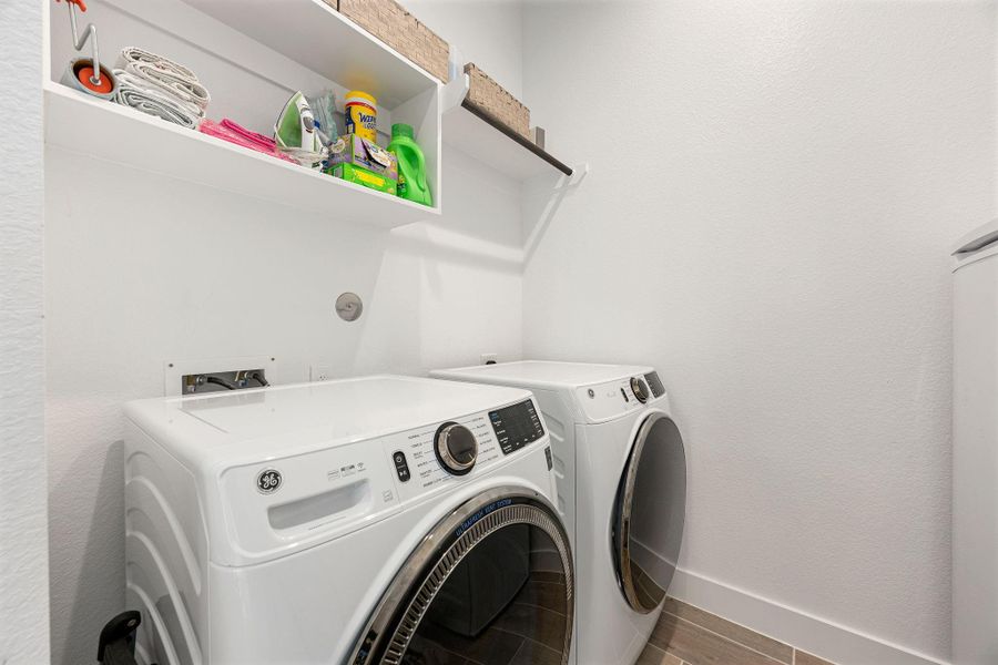 Laundry room located on the second floor. Large enough for washer, dryer and a refrigerator!