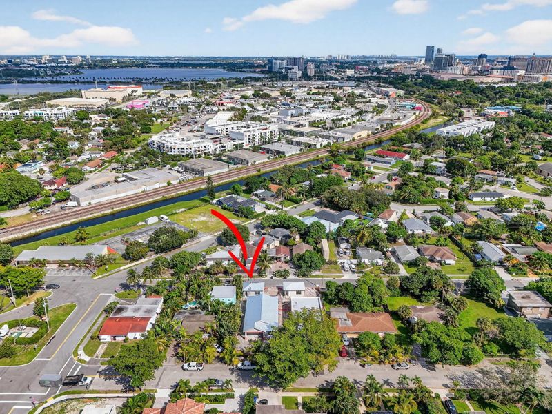 Front exterior of a new home in , West Palm Beach, FL, highlighting curb appeal (Image 24). Front exterior of a new home in , West Palm Beach, FL, highlighting curb appeal (Image 24).