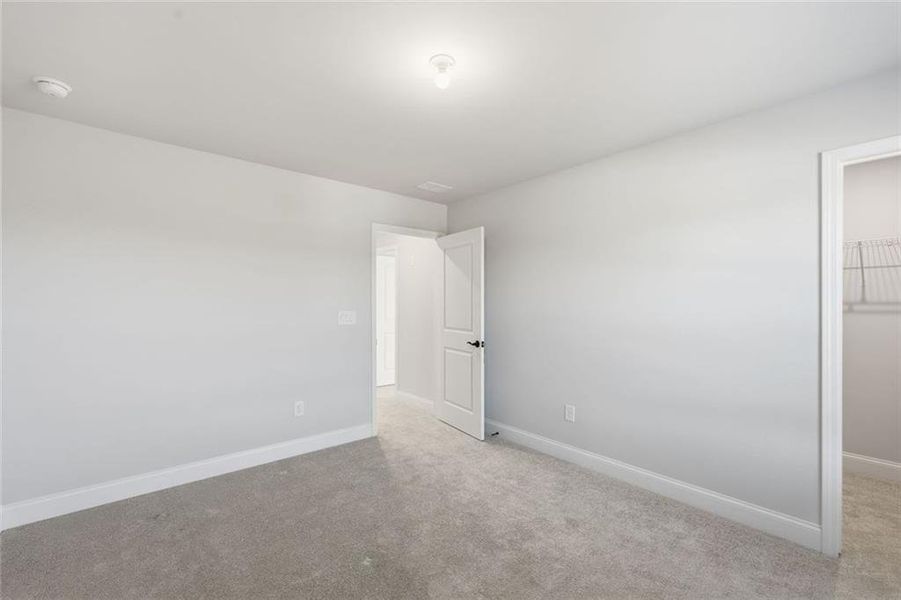 Spacious, unfurnished interior of a new home in Berkeley Mill, Cumming (Image 44).