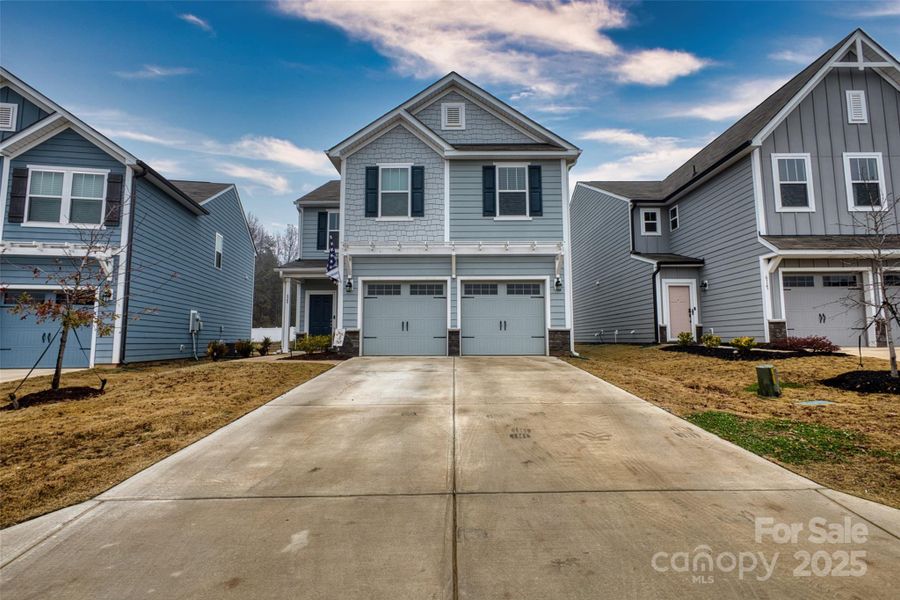 Front exterior of a new home in , York, SC, highlighting curb appeal (Image 2). Front exterior of a new home in , York, SC, highlighting curb appeal (Image 2).