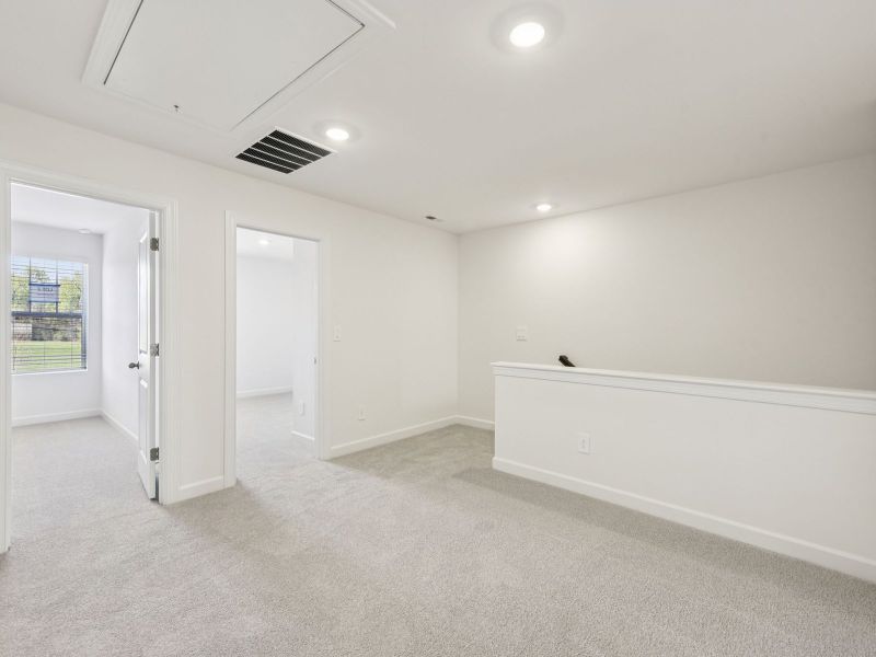 Spacious, unfurnished interior of a new home in Rocky River Towns, Charlotte (Image 12).