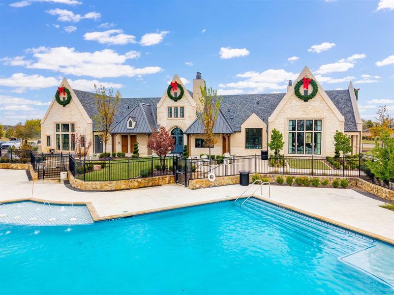 Community pool featuring a patio