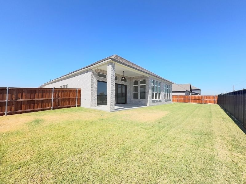 Exterior details and patio area of a home in Polo Ridge, Mesquite (Image 3).
