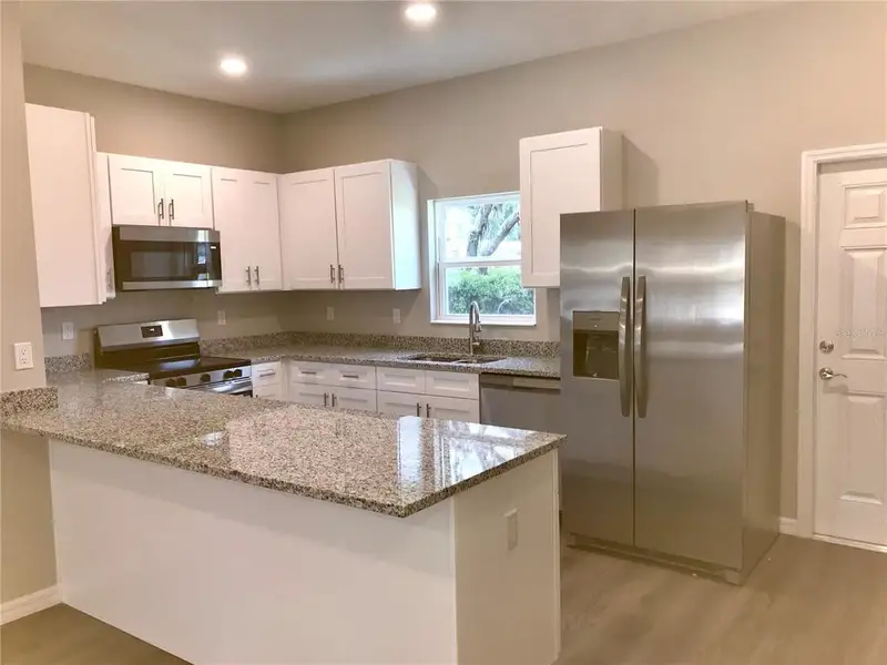 Furnished interior view inside a new home in , Tampa (Image 3).
