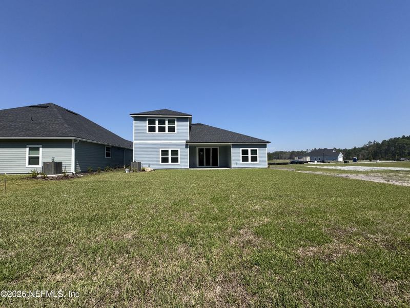 Exterior details and patio area of a home in Hyland Trail, Green Cove Springs (Image 21).