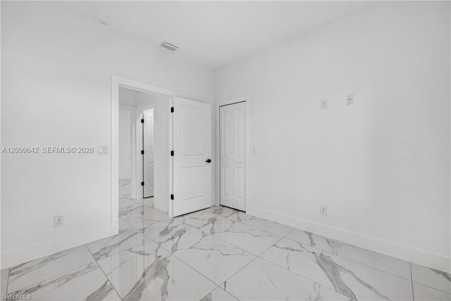 Spacious, unfurnished interior of a new home in , Lehigh Acres (Image 19).
