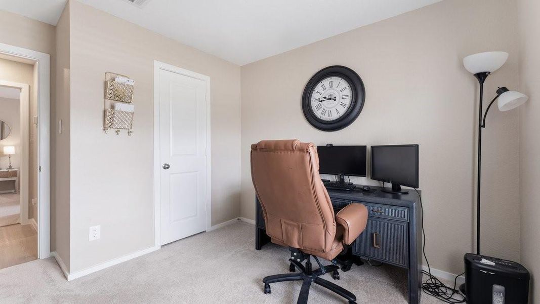 This photo showcases a compact home office . Perfect for a productive workspace at home.
