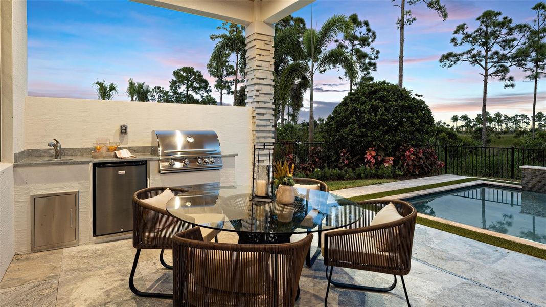Exterior details and patio area of a home in L'Ambiance at Avenir, Palm Beach Gardens (Image 23).