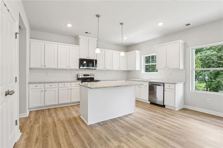 Furnished interior view inside a new home in The Hills at Cedar Creek, Winder (Image 3).