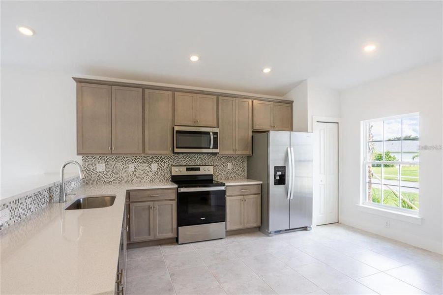 Furnished interior view inside a new home in , Port Charlotte (Image 10).