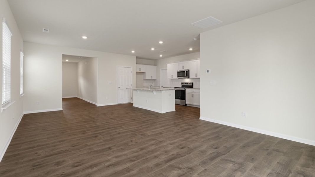 Spacious, unfurnished interior of a new home in The Grove at Matthews Landing, Fuquay Varina (Image 13).