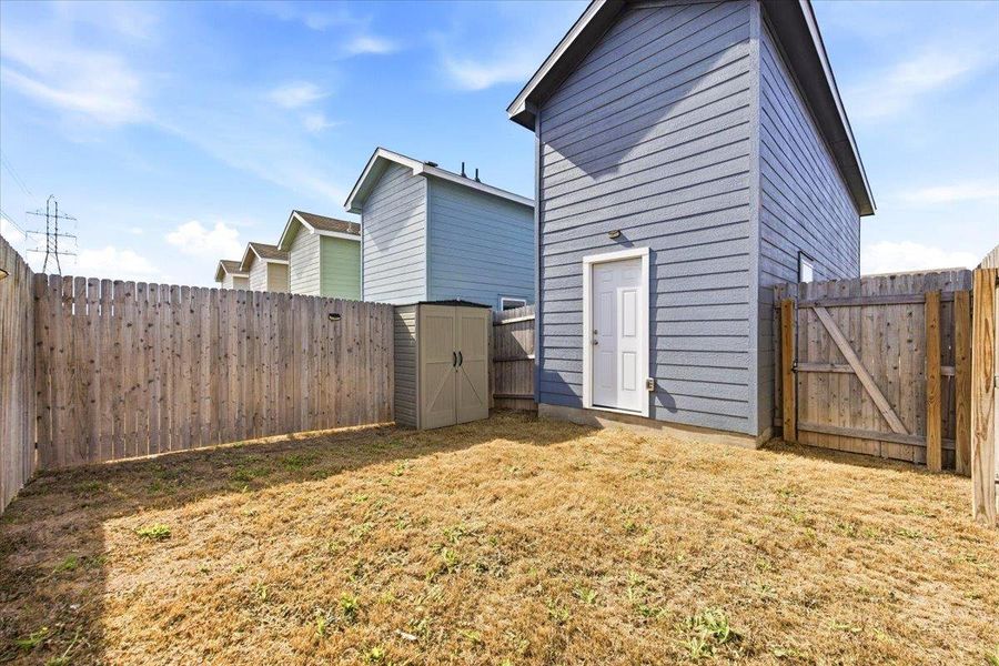 Back yard and back door (not all homes have a back door entry to back yard) Back yard and back door (not all homes have a back door entry to back yard)