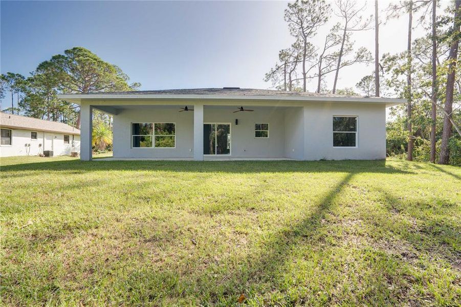 Exterior details and patio area of a home in , Sebring (Image 4). Exterior details and patio area of a home in , Sebring (Image 4).