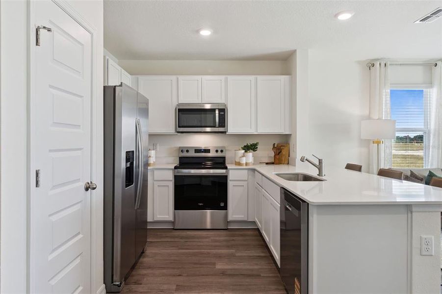 Furnished interior view inside a new home in Danbury at Ridgewood Lakes, Davenport (Image 3). Furnished interior view inside a new home in Danbury at Ridgewood Lakes, Davenport (Image 3).