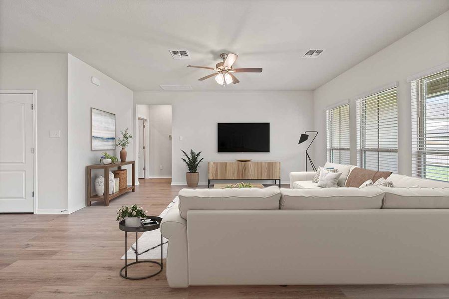 Representative furnished interior of a home built from the Fuller by Omega Builders in Southern Pointe, College Station (Image 7).