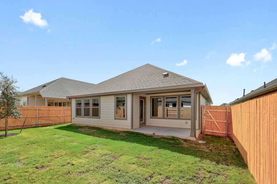Exterior details and patio area of a home in Prairie Winds, Hutto (Image 17).