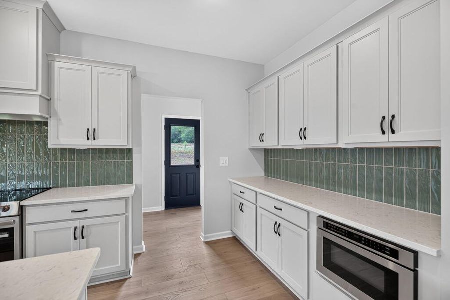 Furnished interior view inside a new home in Blackwelder Bluff, Bowdon (Image 8).