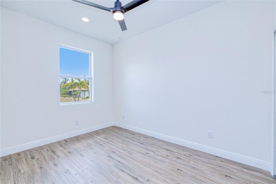 Spacious, unfurnished interior of a new home in , Port Charlotte (Image 21).