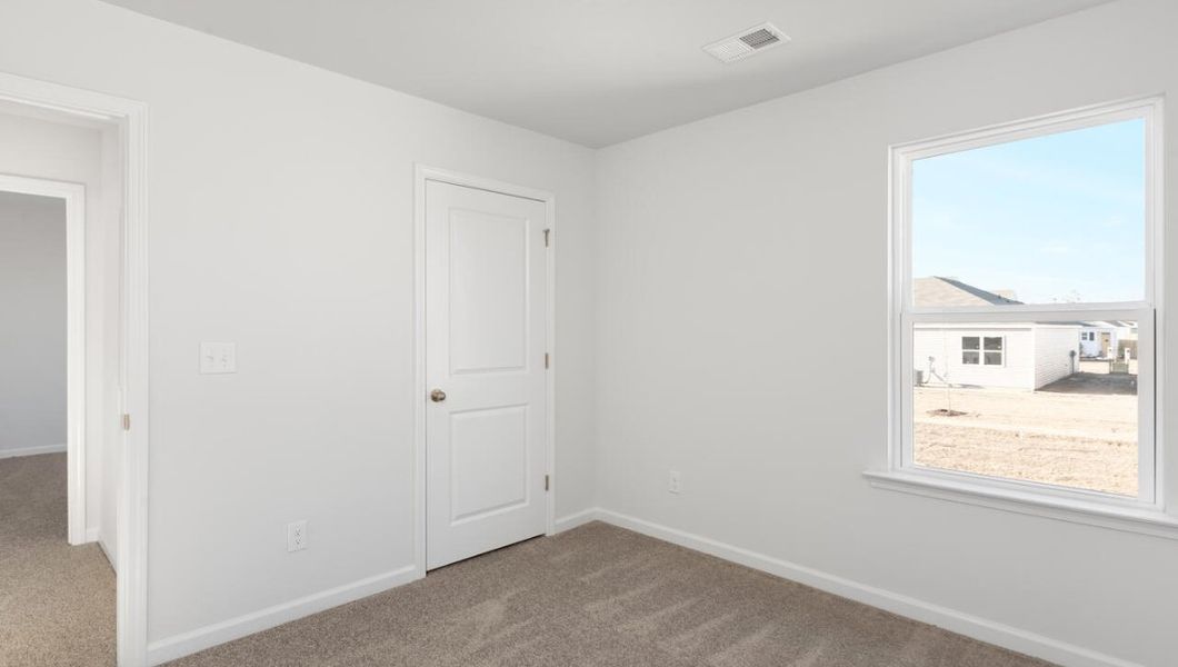 Spacious, unfurnished interior of a new home in The Pines at Blake Farm, Wilmington (Image 21).