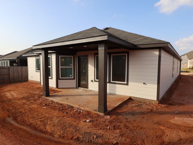 Exterior details and patio area of a home in Moran Ranch, Willis (Image 14).