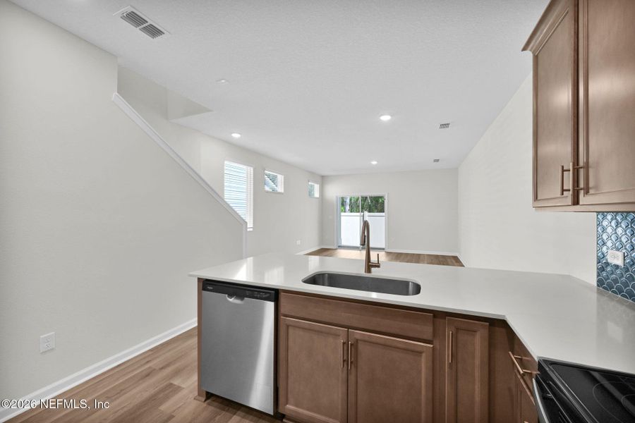 Furnished interior view inside a new home in Baxley Villas, Middleburg (Image 9).