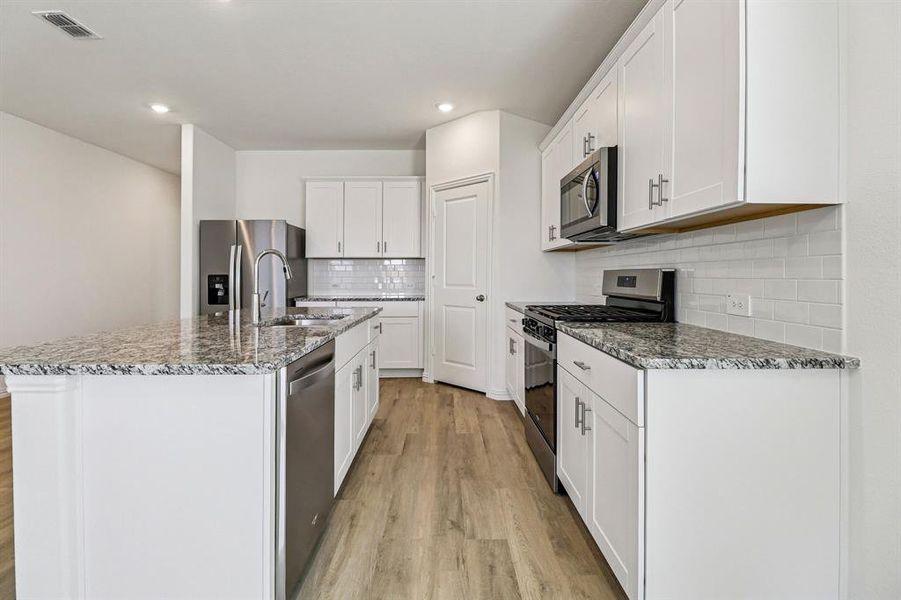 Furnished interior view inside a new home in River Ridge, Crandall (Image 10).