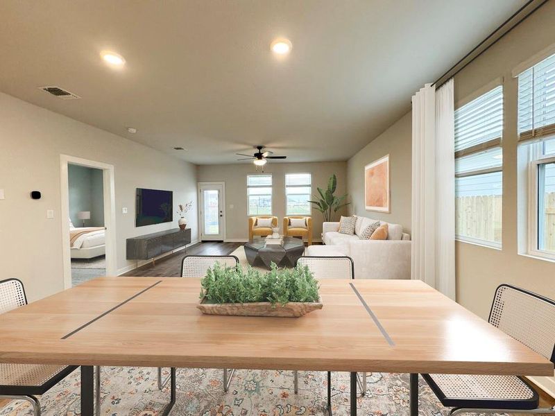 An open floor plan connects the dining area to a spacious living room.