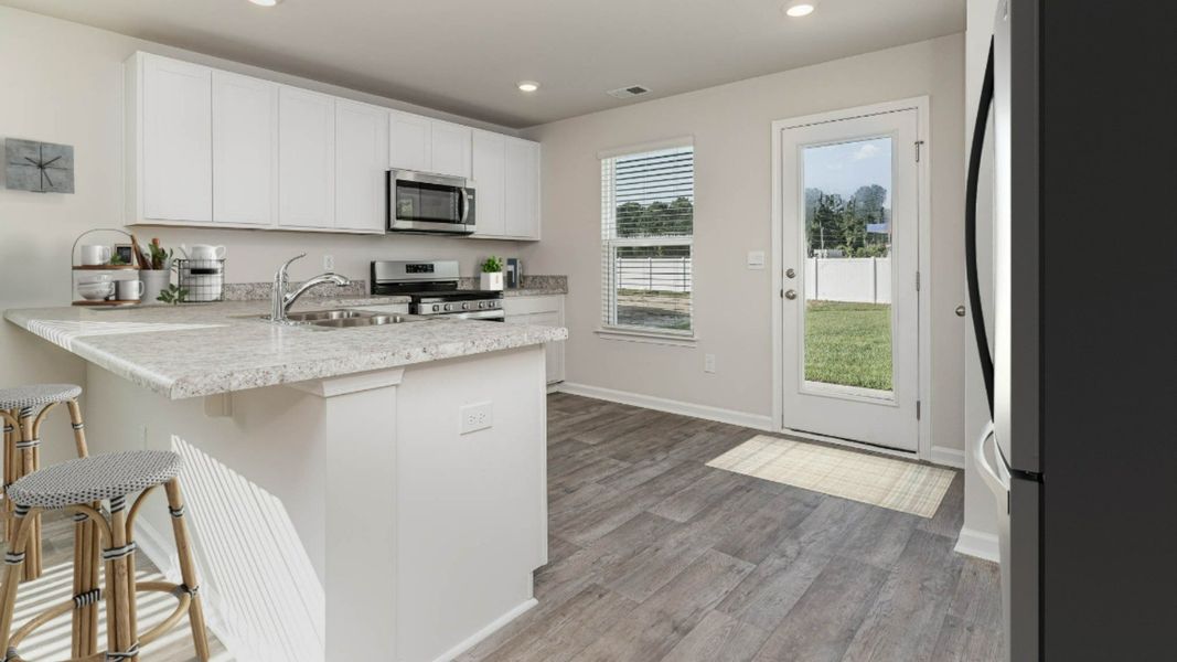 Representative furnished interior of a home built from the CURTIS by D.R. Horton in The Cottages at Blake Farm, Wilmington (Image 19). Representative furnished interior of a home built from the CURTIS by D.R. Horton in The Cottages at Blake Farm, Wilmington (Image 19).