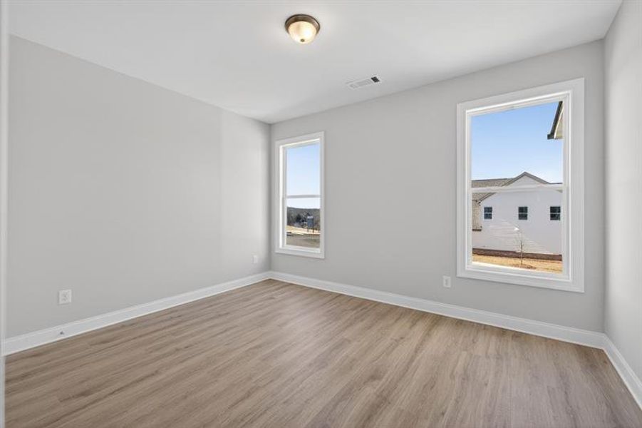 Spacious, unfurnished interior of a new home in Hemingway, Flowery Branch (Image 22).