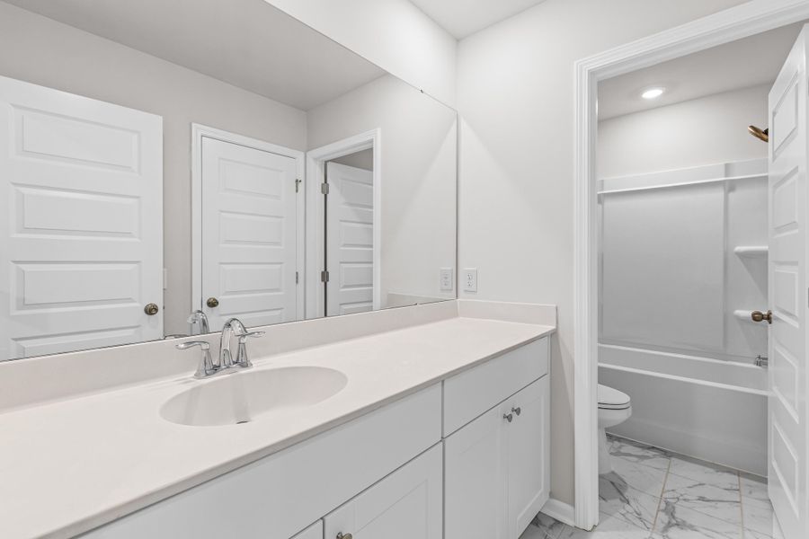 Furnished interior view inside a new home in Sweetgrass at Summers Corner, Summerville (Image 7).