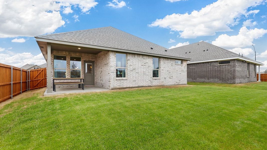 Representative exterior photo of a completed home built from the PORTALES by D.R. Horton in Bluestem, Rhome, TX (Image 2).