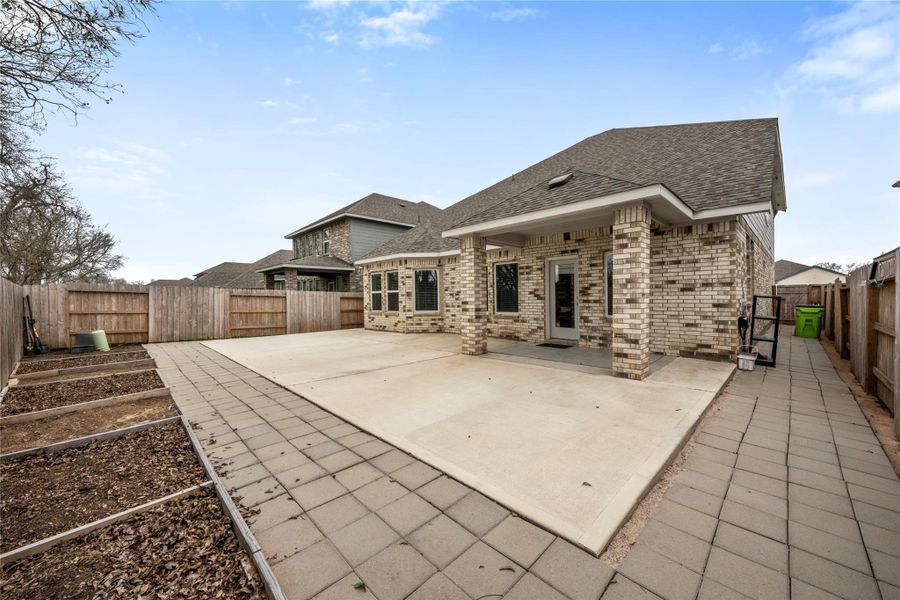 Private backyard space ideal for outdoor relaxation, entertaining, or future customization. A great area to enjoy outdoor activities or create your own personal retreat.