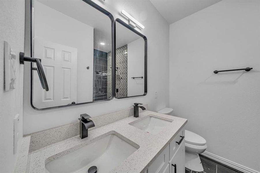 Bathroom with vanity and toilet