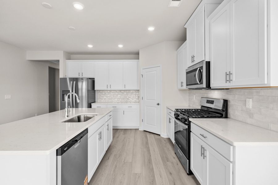 Furnished interior view inside a new home in Cypress Ridge - The Coastline Series, Longs (Image 6).
