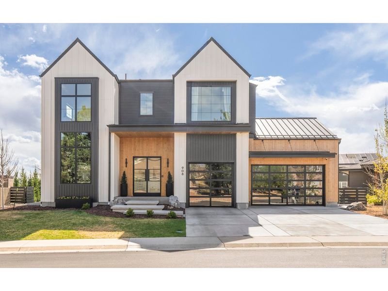 Front exterior of a new home in , Louisville, CO, highlighting curb appeal (Image 25).