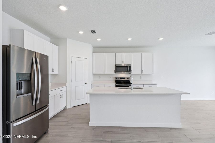 Furnished interior view inside a new home in Flagler Village - Signature Series, Palm Coast (Image 5).