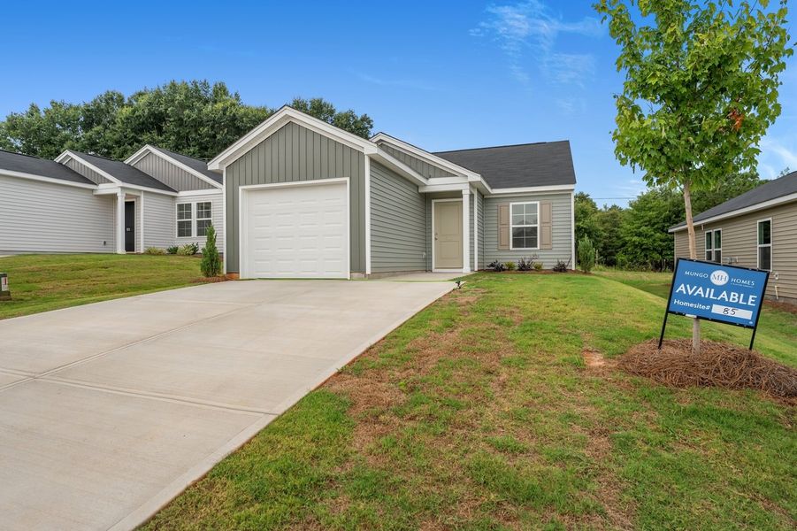 Front exterior of a new home in Evergreen, Spartanburg, SC, highlighting curb appeal (Image 2). Front exterior of a new home in Evergreen, Spartanburg, SC, highlighting curb appeal (Image 2).