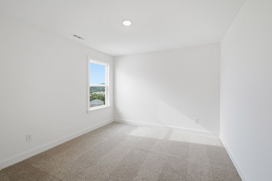 Spacious, unfurnished interior of a new home in The Retreat at Norman Farm, Hendersonville (Image 34).