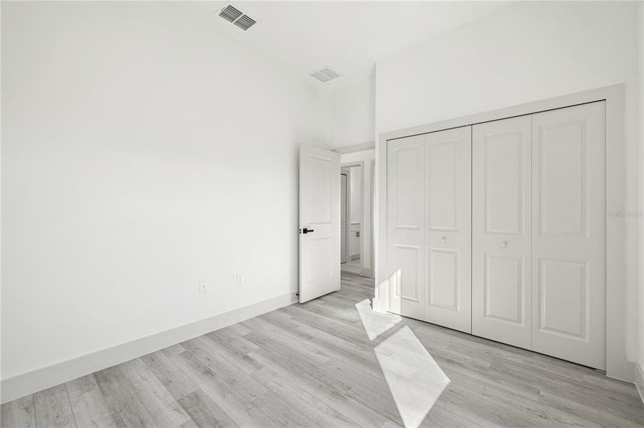 Spacious, unfurnished interior of a new home in , Port Charlotte (Image 40).