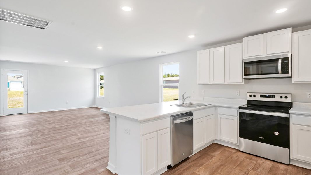 Furnished interior view inside a new home in Lockwood Landing, Supply (Image 6). Furnished interior view inside a new home in Lockwood Landing, Supply (Image 6).
